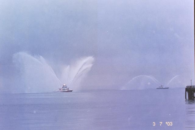 Tugboat water spraying