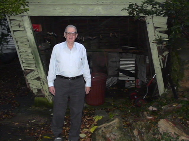 Papa and His Leaning Garage