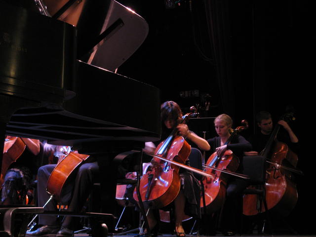 Celloists at warmup