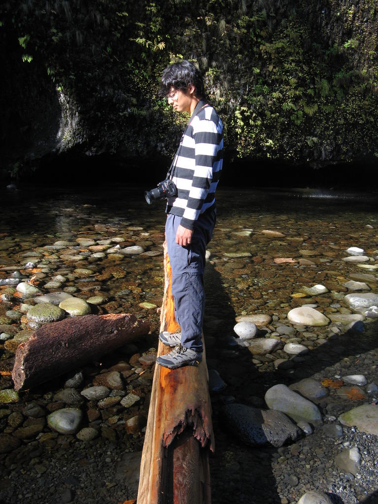Andrew on a Log