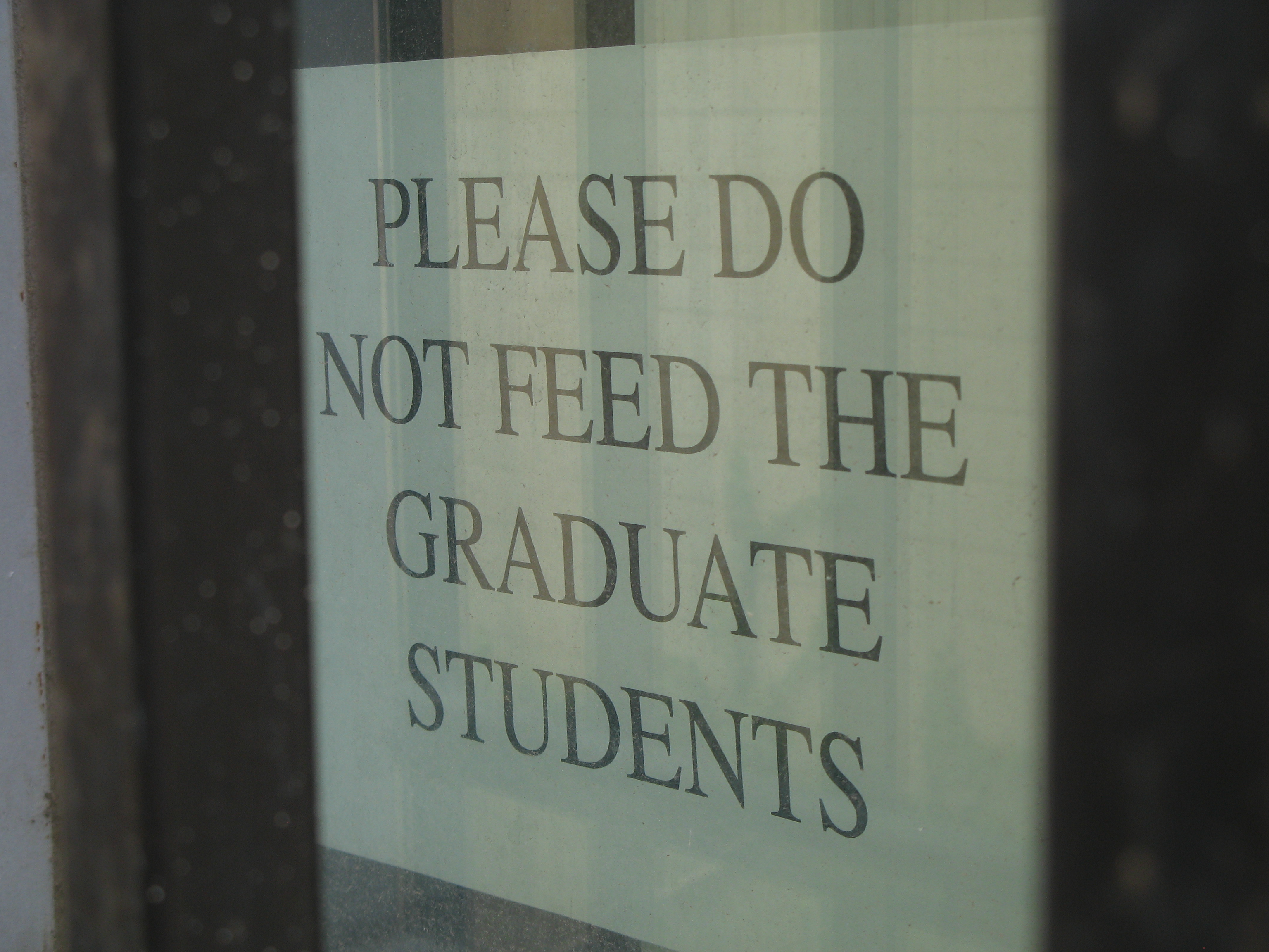 TERTL Window Sign: "PLEASE DO NOT FEED THE GRADUATE STUDENTS"
