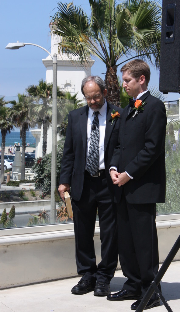 Shane and the Pastor Praying Before the Ceremony