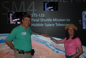 Mom and Dad With the STS-125 Board