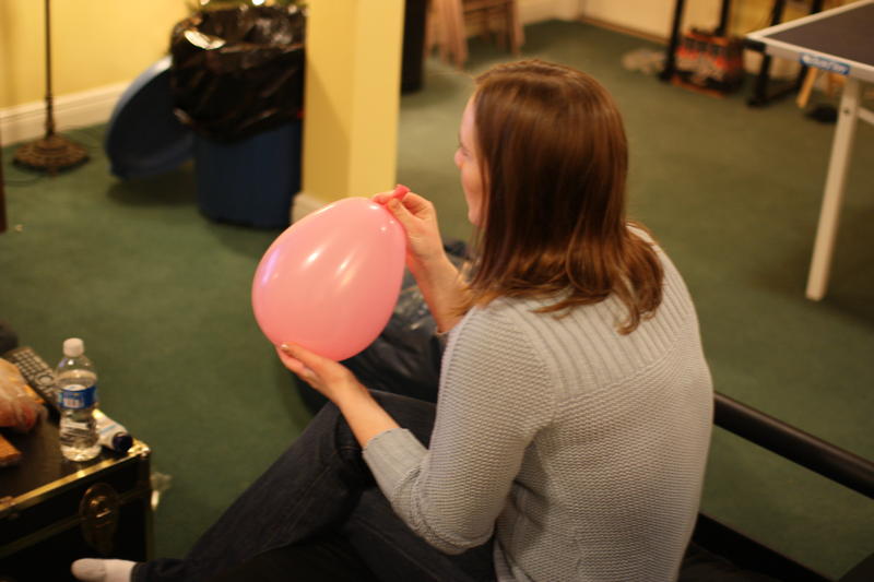 Lori Inflating a Balloon