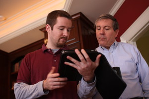 Hampton and Dad looking at the iPad