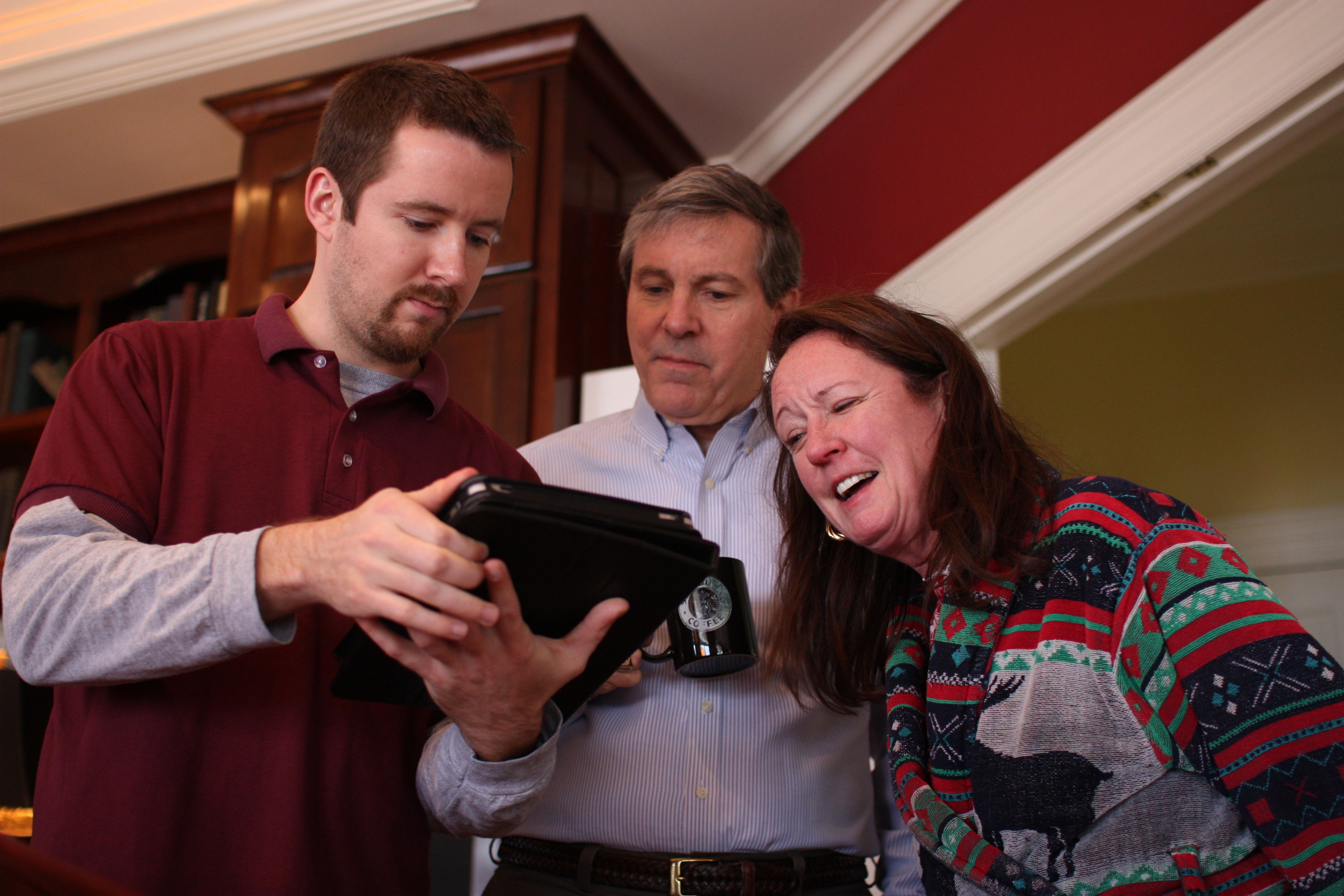 Hampton, Dad, and Mom on an iPad